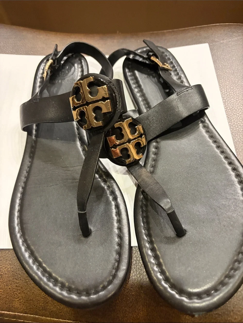 Tory Burch Black Leather Sandals with Gold Logo Medallions